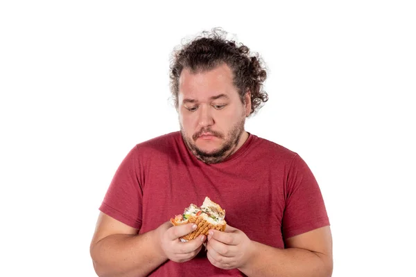 悲しいデブ男を食べるハンバーガー ファーストフード Unhealty を食べる — ストック写真