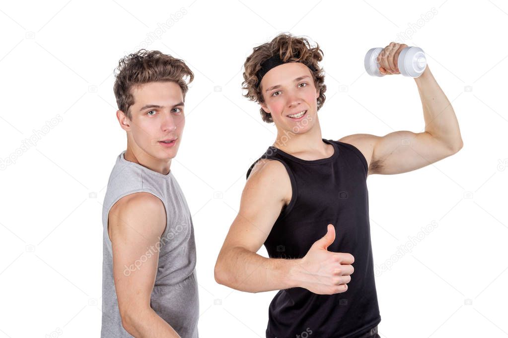 Two handsome guys doing fitness workout with weights isolated