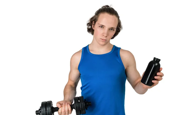 Handsome young man in blue shirt lifting dumbbell. White background isolated — Stock Photo, Image