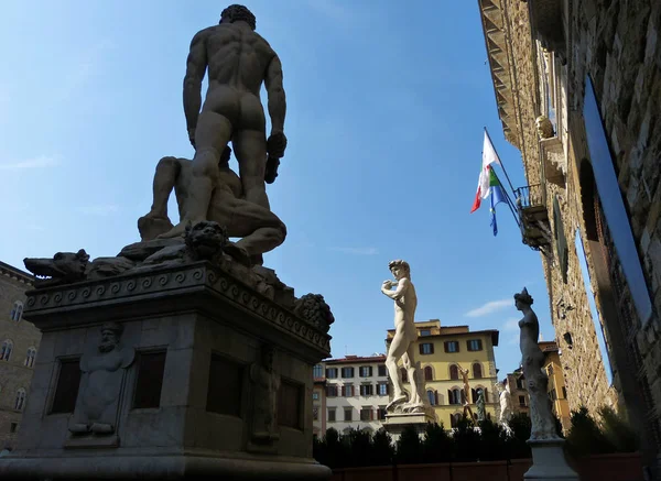 Entrance of Palazzo Vecchio with the statues of David and Hercules in Florence, Italy