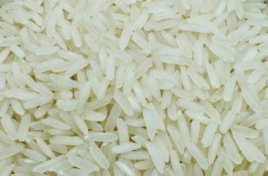 Pişmemiş Basmati pirinci yakın plan. Basmati pirinç dokusu, arkaplan