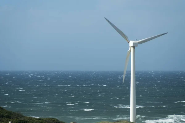 Wind turbine on the Danish North Sea coast. Focus on the right.