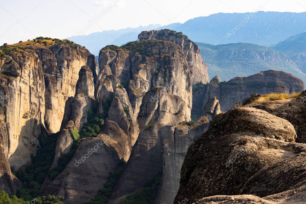 Great view of the monasteries of Meteora in Greece. Landscape with monasteries and rocks in the sunset