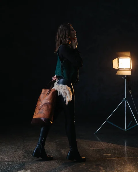 Leather bag with a model