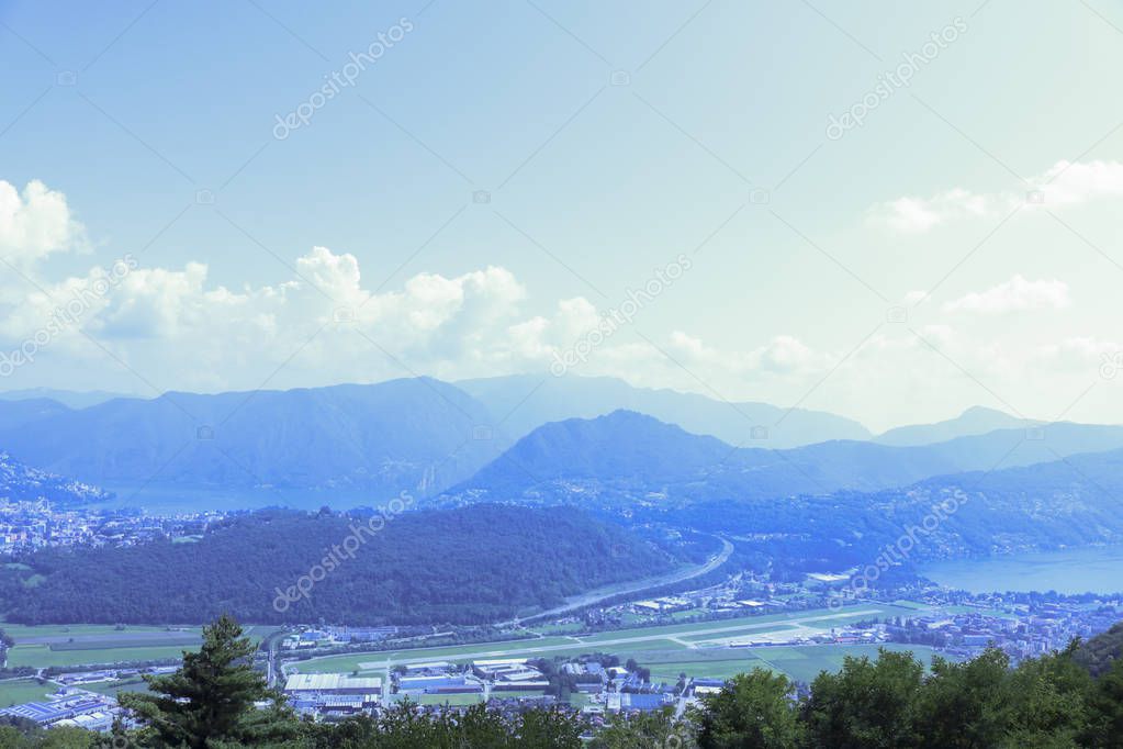 Top view of the mountains and the lake and of the city of Lugano from Cademario, landscapes and nature