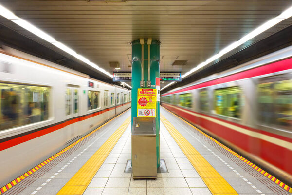 People travel through tokyo subway system