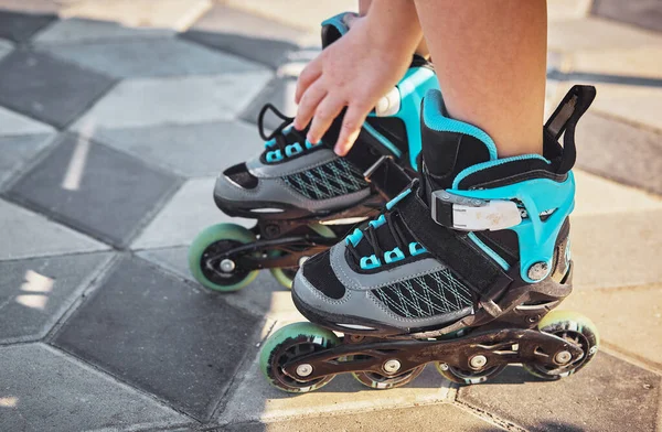 Roller skates and shoes. Childhood, activity.Selective focus