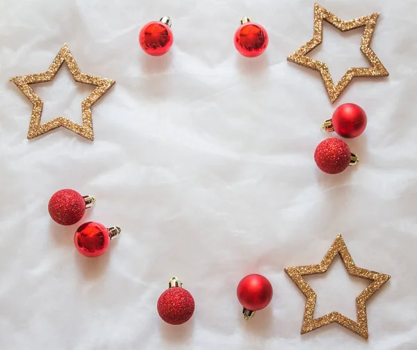Christmas balls and stars on white background