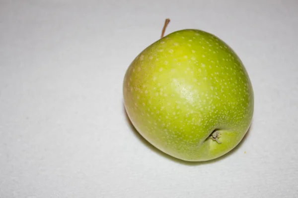 green apple on white background