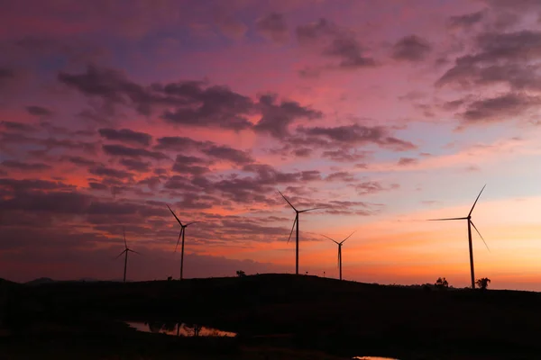 Stock image Silhouettes of wind Turbine in sunset mood, Pitsanulook, Northern of Thailand