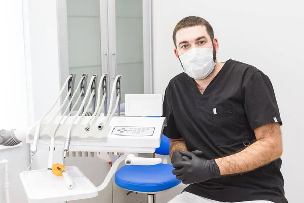 Dental clinic. Reception, examination of the patient. Teeth care. Portrait of a dentist in a dental office