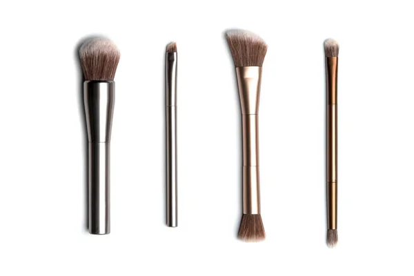 Cuatro Pinceles Maquillaje Color Bronce Plata Brillantes Para Aplicar Polvo —  Fotos de Stock