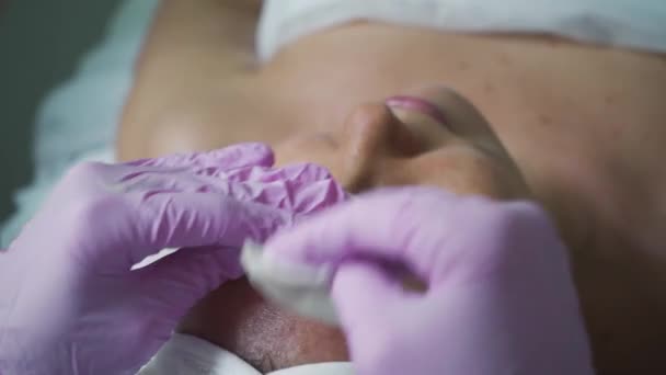 Beautician Spa Salon Does Face Cleaning Pink Gloves Massaging Woman — Stock Video