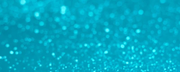 Festival defocused mavi glitter bokeh soyut arka plan.