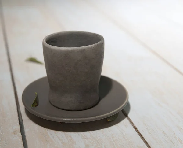 Platos de cerámica: una taza y platillo —  Fotos de Stock