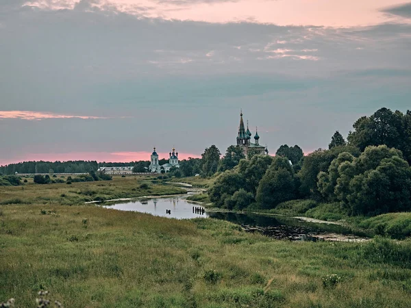 church by the river. summer landscape in the russian village
