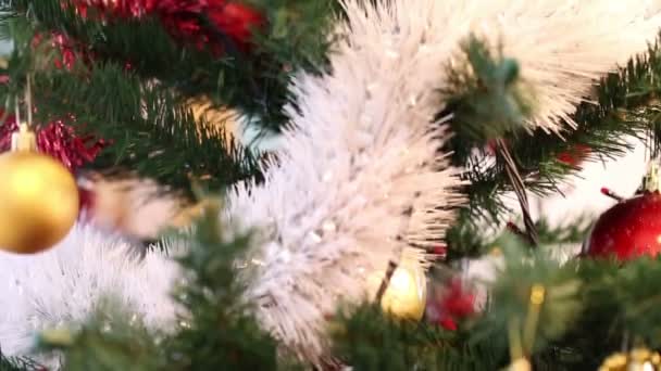 Christmas Decorations Christmas Tree Branches Fir Hanging Baubles Glowing Garlands — Stock Video