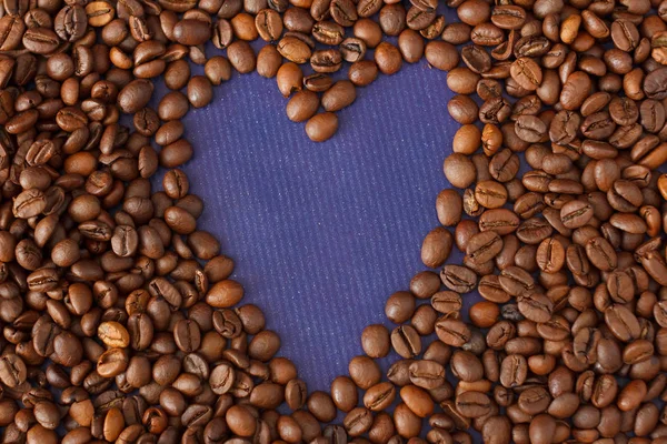 Heart Coffee Frame Made from Coffee Beans on Violet Texture Background