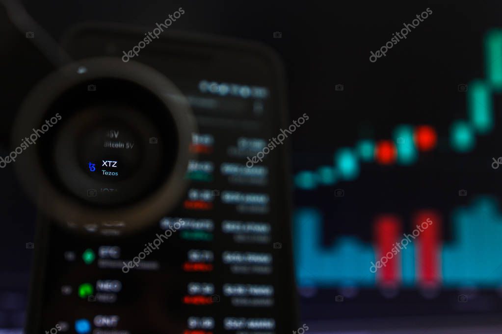 SAN FRANCISCO, US - 9 May 2019: A Graph of Increasing Trend of XTZ Tezos Cryptocurrency. The Illustration of Green Candles Bar Raising Trend, San Francisco, California, USA. An Illustrative Editorial Image.
