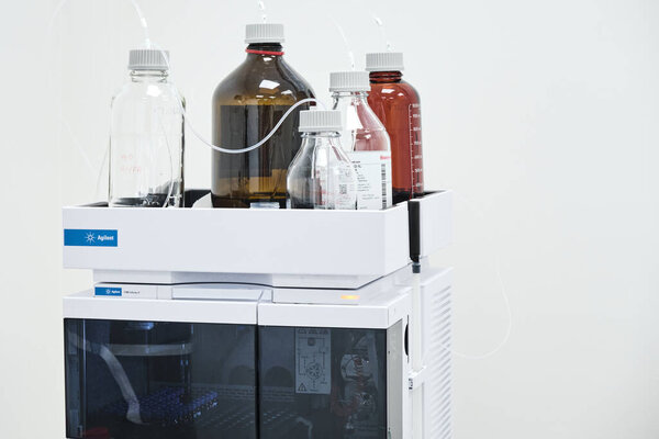 Mobile phase solvents on the Agilent HPLC system for separation of organic compounds in chemical or pharmaceutical laboratory. September 2020, San Francisco, USA 