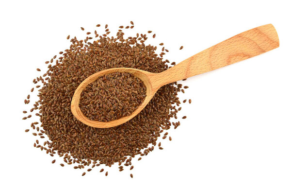 Isolated Flax Seed Heap with Spoon (Flaxseed, Linseed).