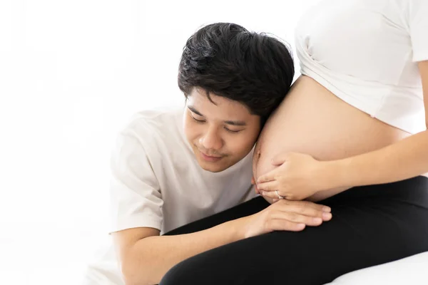 Lovely Asian Husband Gently Listening Belly His Pregnant Wife While — Stock Photo, Image