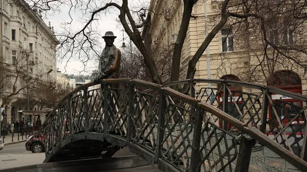 Statue of Hungarian communist politician Ymre Nagy standing on a bridge in Budapest