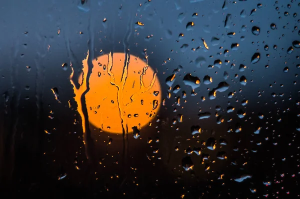 raindrops on the window, drips of water on the glass