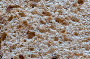 Arka plan makro çekim için doğal organik gözenekli ekmek yapısını