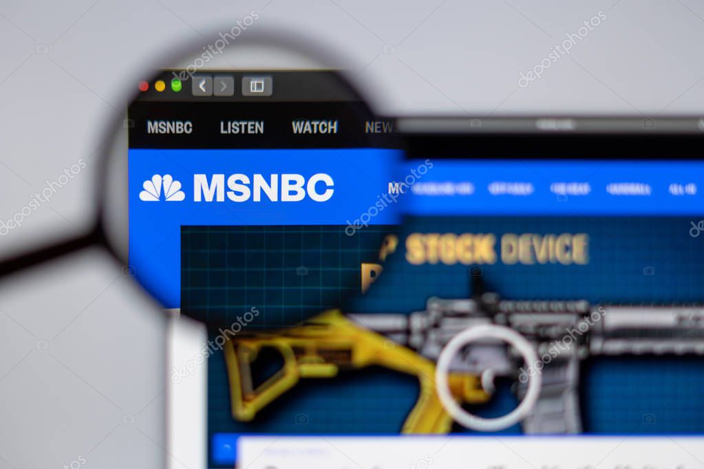 New York, USA - March 26, 2019: News media MSNBC website homepage. MSNBC News logo visible  through a magnifying glass.
