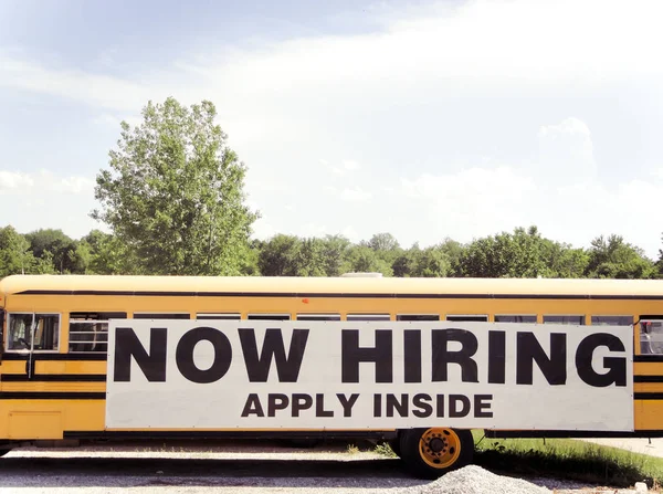School Bus Now Hiring Sign