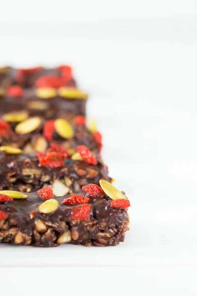 Vegan Chocolate Bars Granola Nuts Pumpkin Goji Berries Chia Seeds — ストック写真