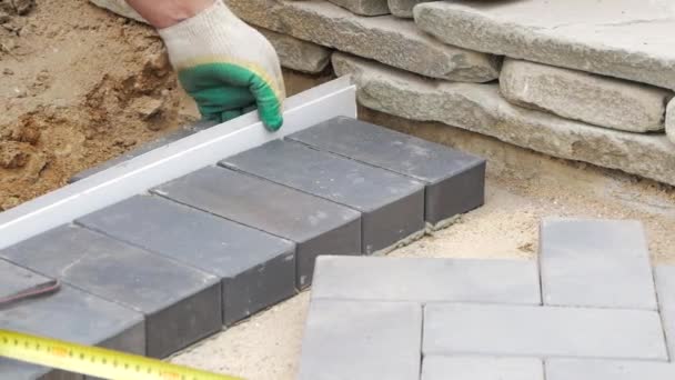 Laying Paving Slabs Close-Up. Road Paving, Construction. — Stock Footage Laying Paving Slabs Close Road Paving Construction Royalty Free Stock Footage
