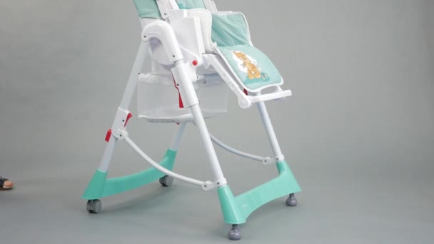 Mom Shows Children High Chair — Stock Video