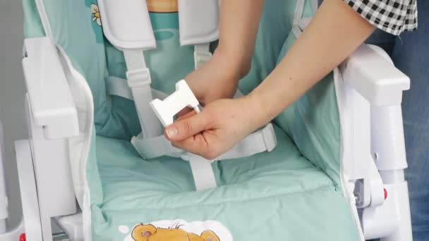 Mom Shows Children High Chair — Stock Video