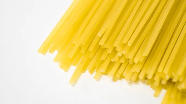 Yellow Italian Pasta Long Spaghetti Raw Spaghetti Food Background Concept — Stock Photo, Image