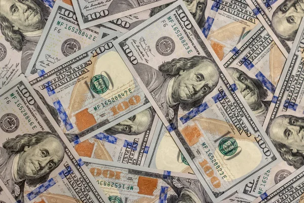 Stapel neuer Dollarscheine als Hintergrund. Aussichtspunkt von oben — Stockfoto
