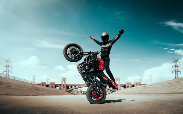 Moto freestyle. Motorcycle stunt rider