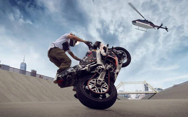 Moto freestyle. Motorcycle stunt rider