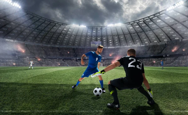Soccer players in action on professional stadium.