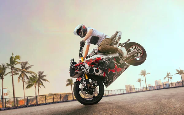 Moto freestyle. Motorcycle stunt rider