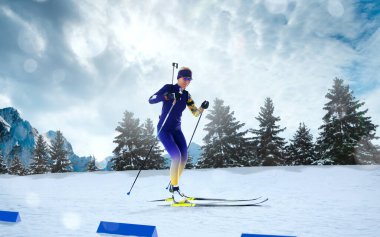 Biatlon. Kayakçı biatlon şampiyonu. Kış Olimpiyat sporları.