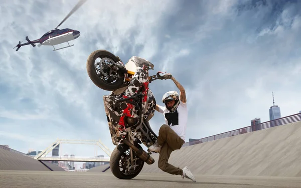 Moto freestyle. Motorcycle stunt rider