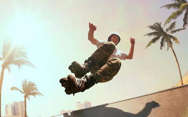 Young Male Roller Performing Trick — Stock Photo, Image