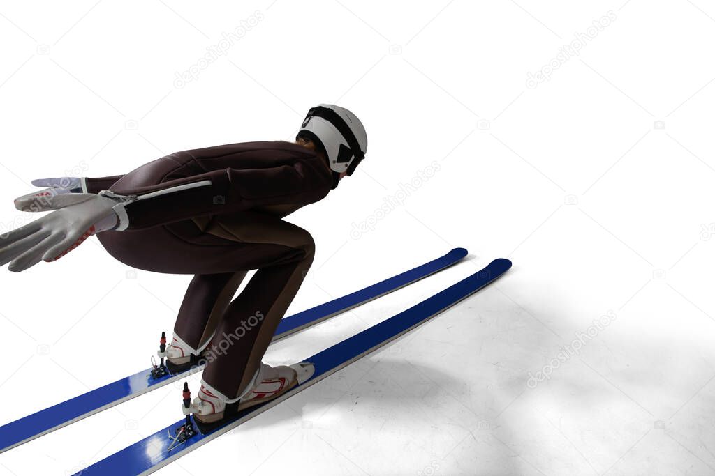 Jumping skier isolated on white.