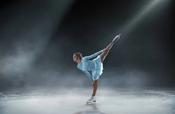 Young woman figure skating.