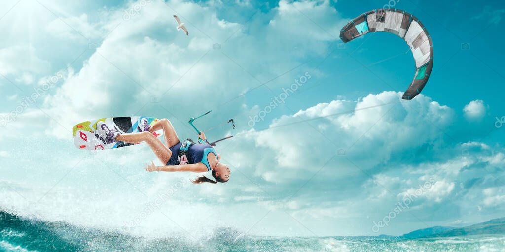 Young woman kite surfing.