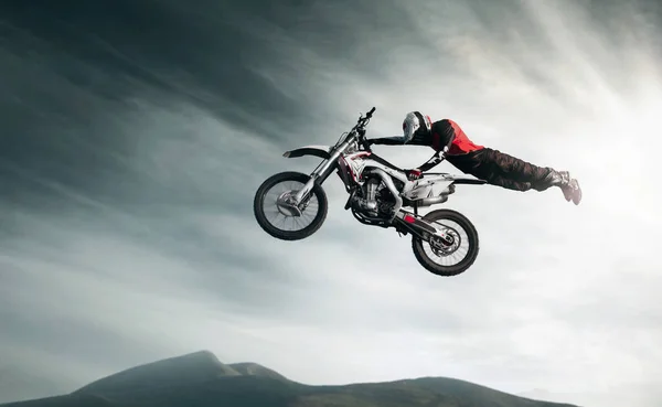 Moto freestyle. Motorcycle stunt rider