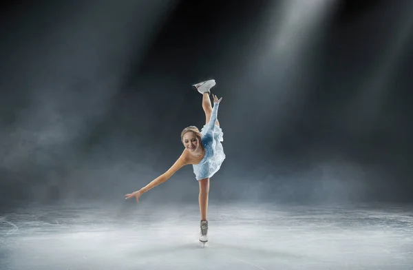 Young woman figure skating.