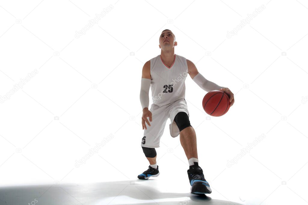 Basketball player isolated on white.